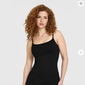 SOFTMOTION STRAPPY VEST WITH BUILT IN BRA SHELF WITH WHITE LOGO